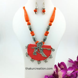 Orange fabric & Cotton Beads Necklace Set with Oxidized Krishna Pendant & earrings